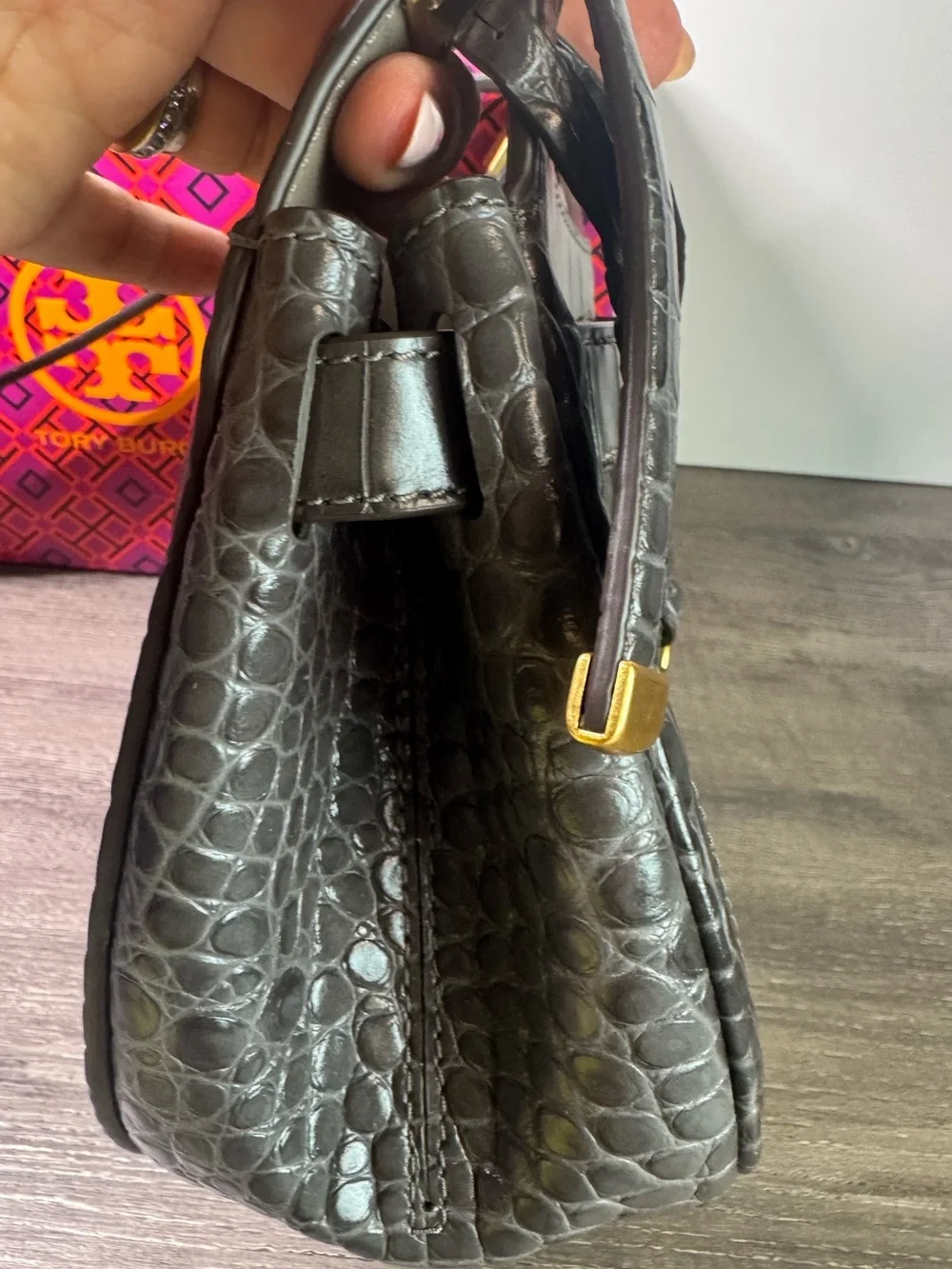 Tory Burch piece see